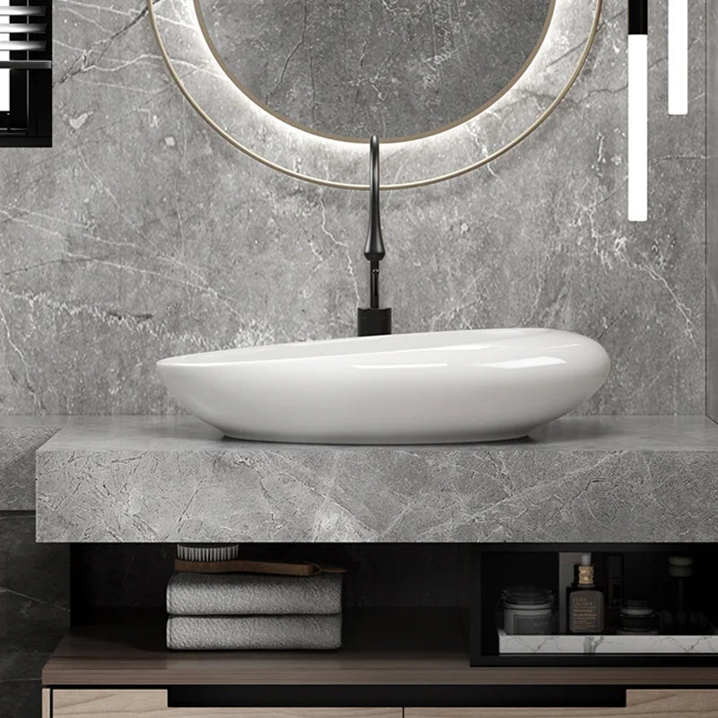 Elegant Ceramic Vessel Sink, Oval-Designed Ceramic Washbasin - an Ideal Choice for Modern Bathroom Fixtures, Suitable for Dressing Rooms, Vanity Tables, and Bathrooms