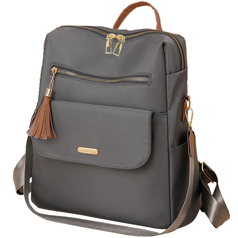 Chic Stylish Multi-Color Backpack with Tassel Detail, Adjustable Strap, Lightweight for Daily Use, Casual Functional Fashionable Bag