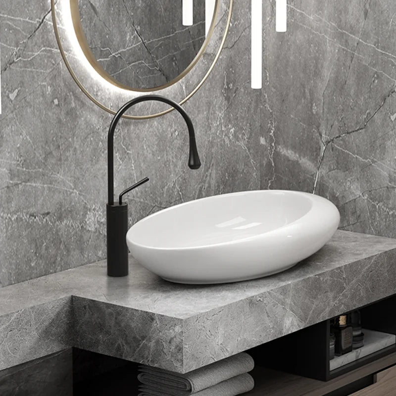 Elegant Ceramic Vessel Sink, Oval-Designed Ceramic Washbasin - an Ideal Choice for Modern Bathroom Fixtures, Suitable for Dressing Rooms, Vanity Tables, and Bathrooms